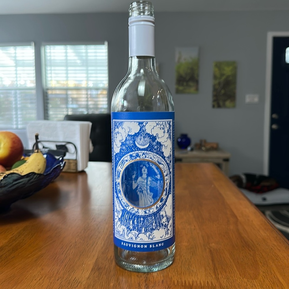 Nola Grace wine bottle, Sauvignon Blanc California from 2023. Blue/white label